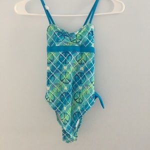 A size 10 in children’s, 1 piece swimsuit.